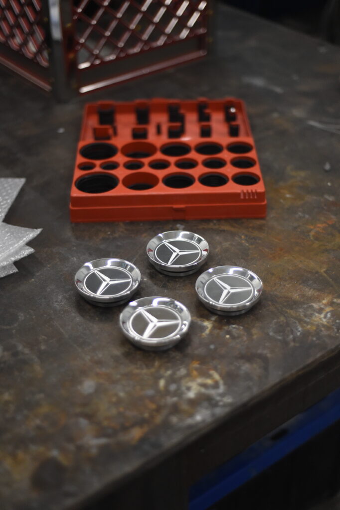 Custom CNC machined and polished mercedes centre caps